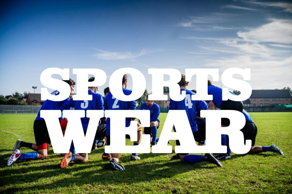 Teammates is discusing to play match in ground wearing uniform